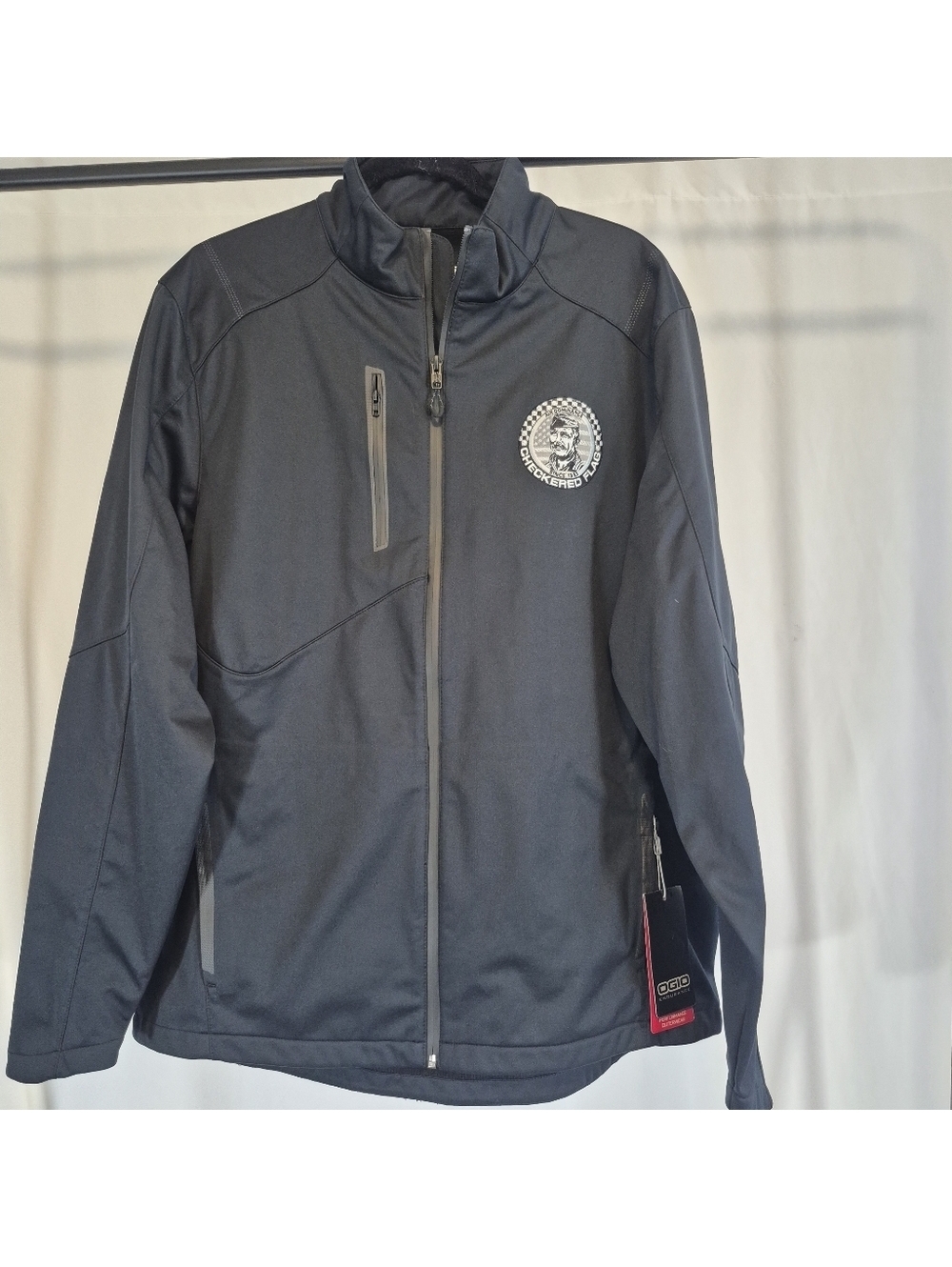 OGIO Mens XL soft shell jacket with a "Checkered Flag" logo NWT